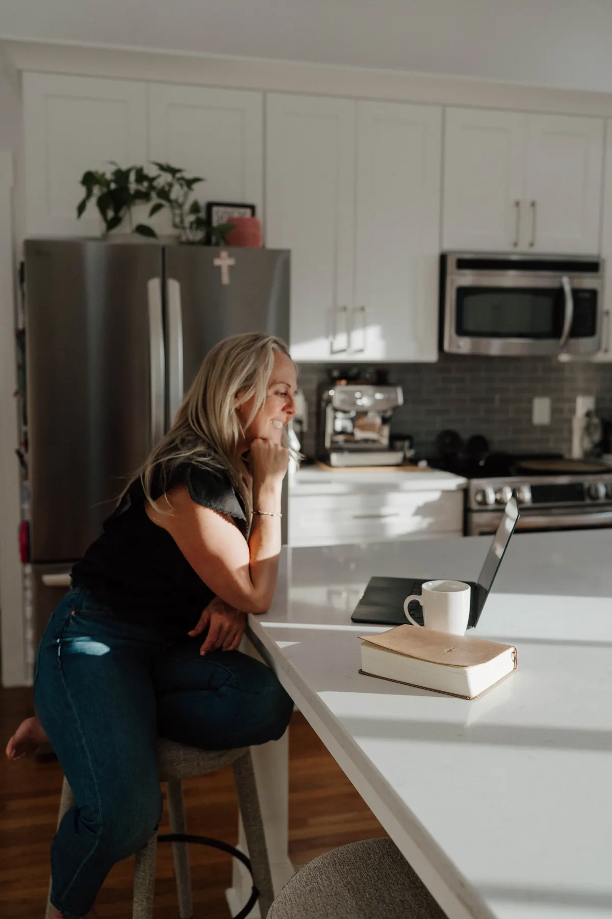 Dr. Martha Nessler writing at home